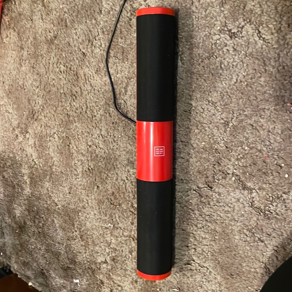 Red and Black sound bar speaker with good sound quality for the size.